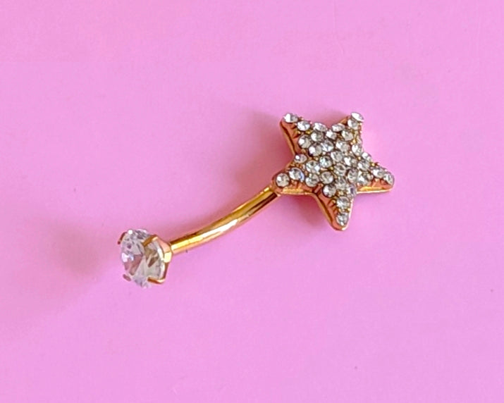 Piercing doré étoile