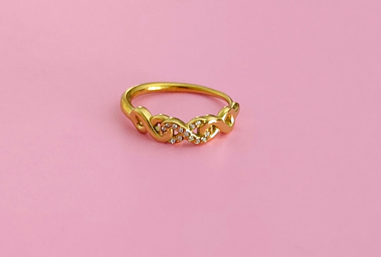 Bague dorée infini