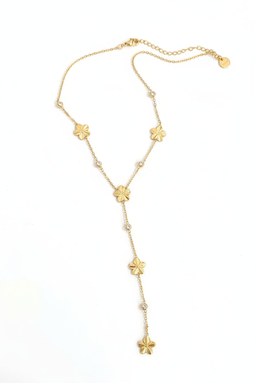Collier doré y fleurs