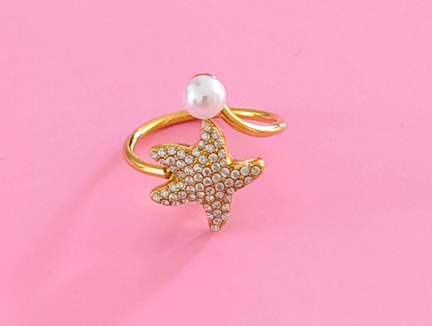 Bague dorée étoile de mer perle