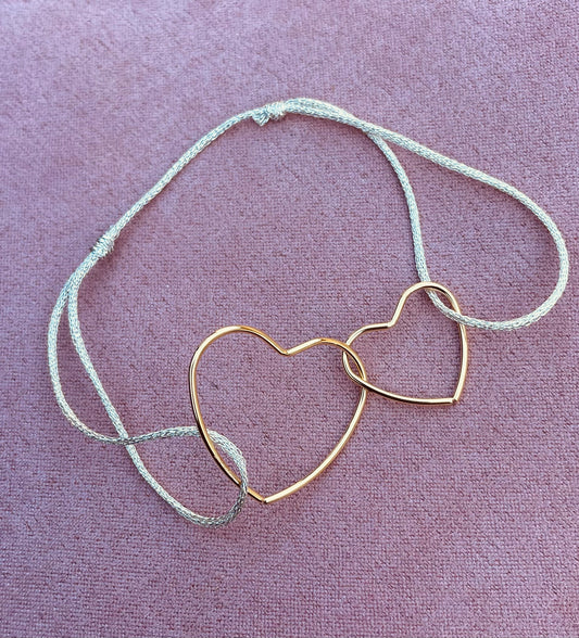 Bracelet doré cœurs cordon