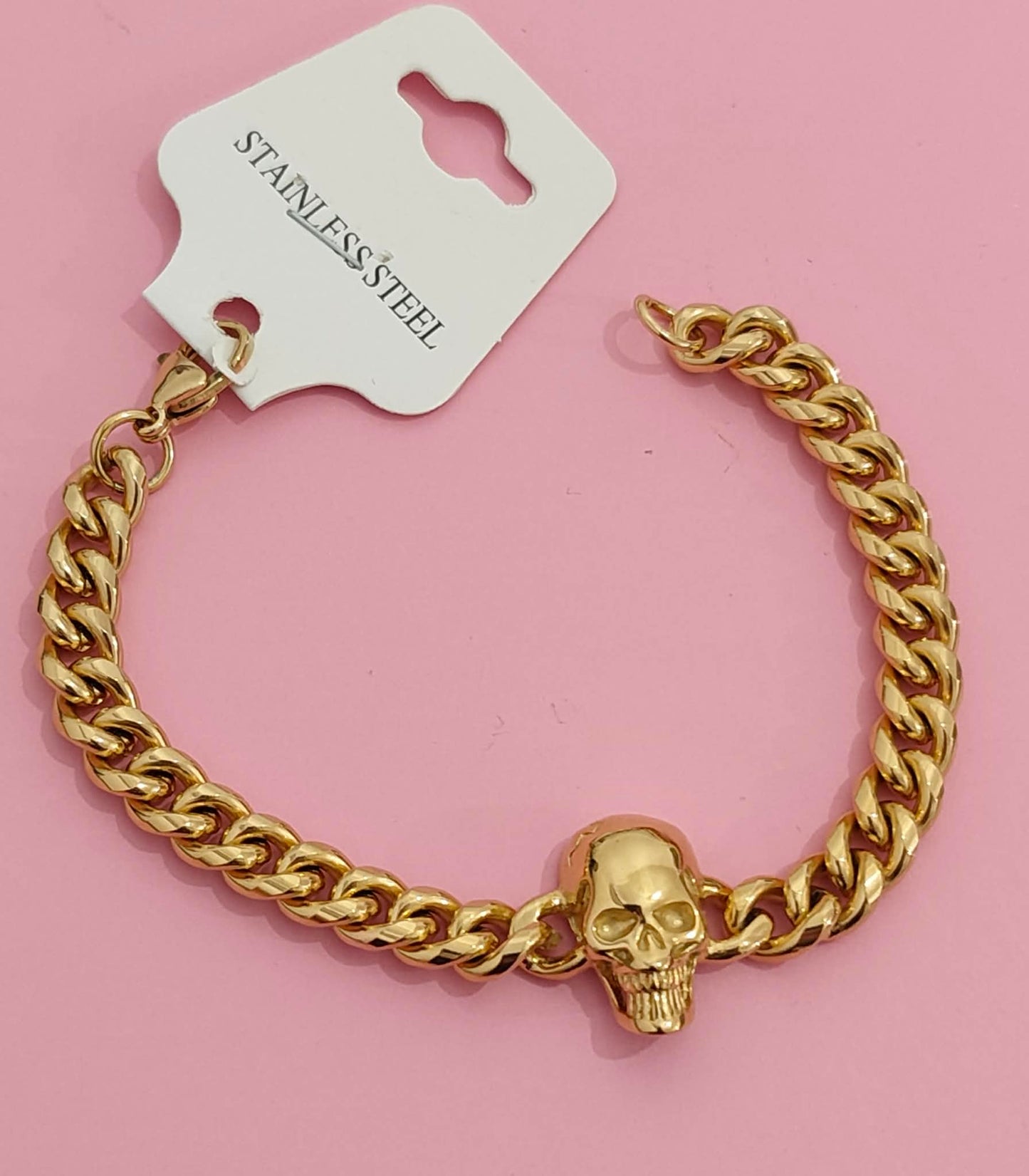 Bracelet doré tête de mort