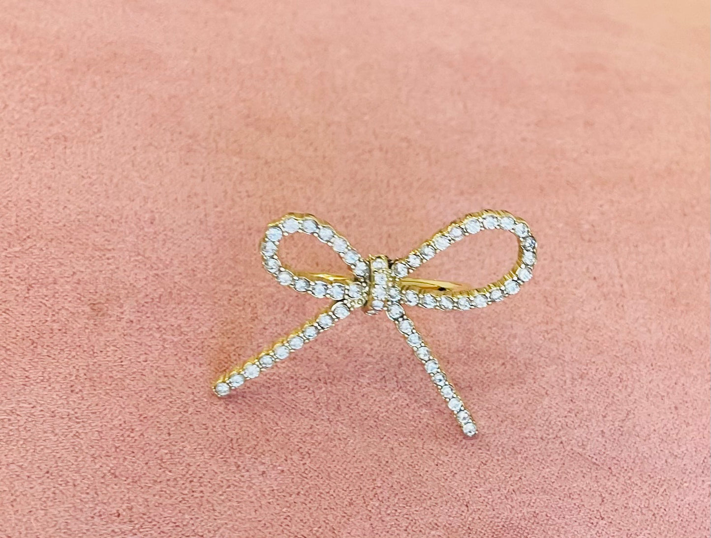 Bague dorée noeud strass