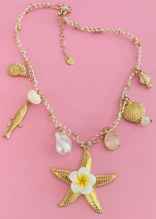Collier doré étoile de mer cordon blanc ✨