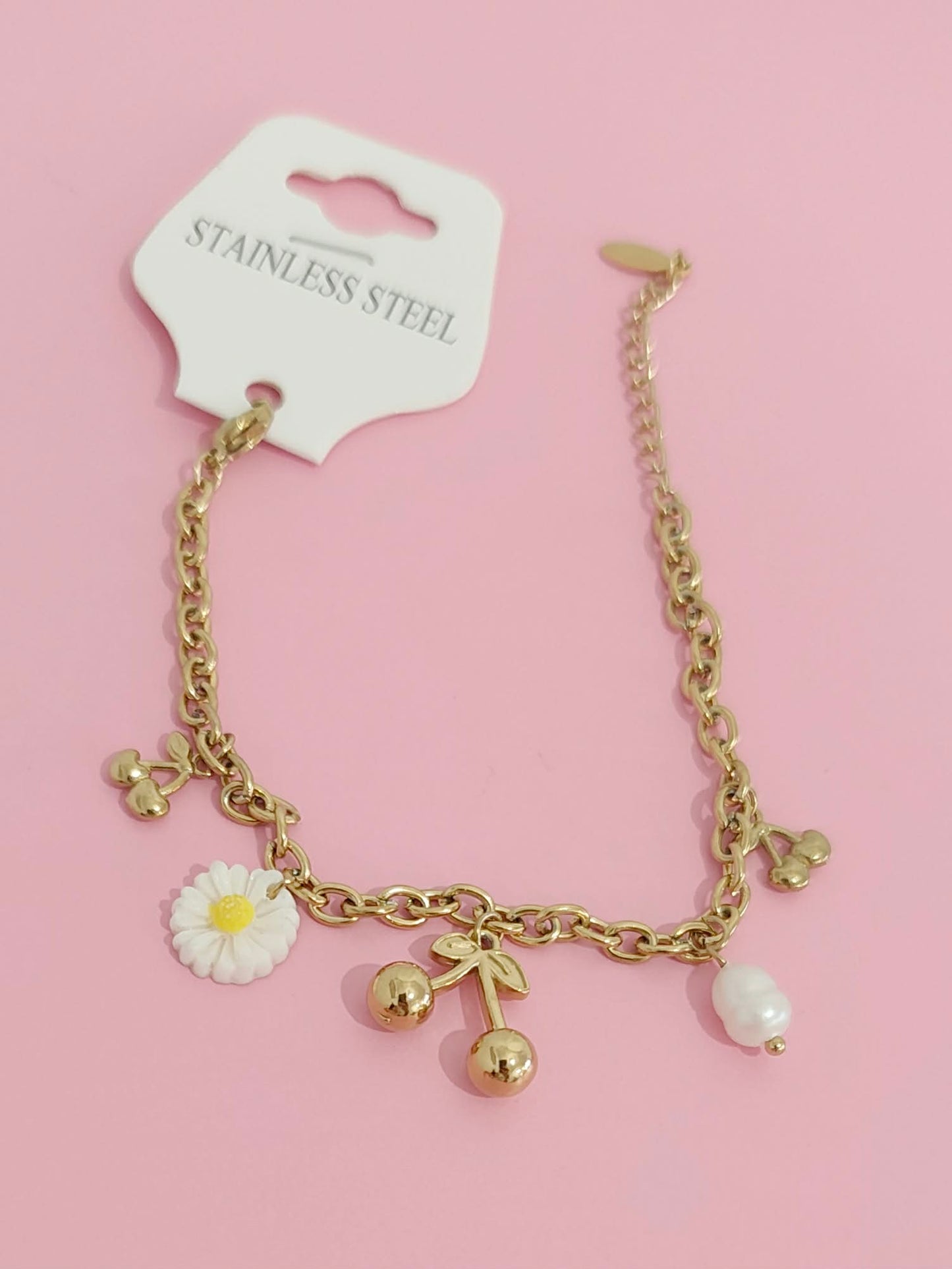 Bracelet doré breloques 🌸💕