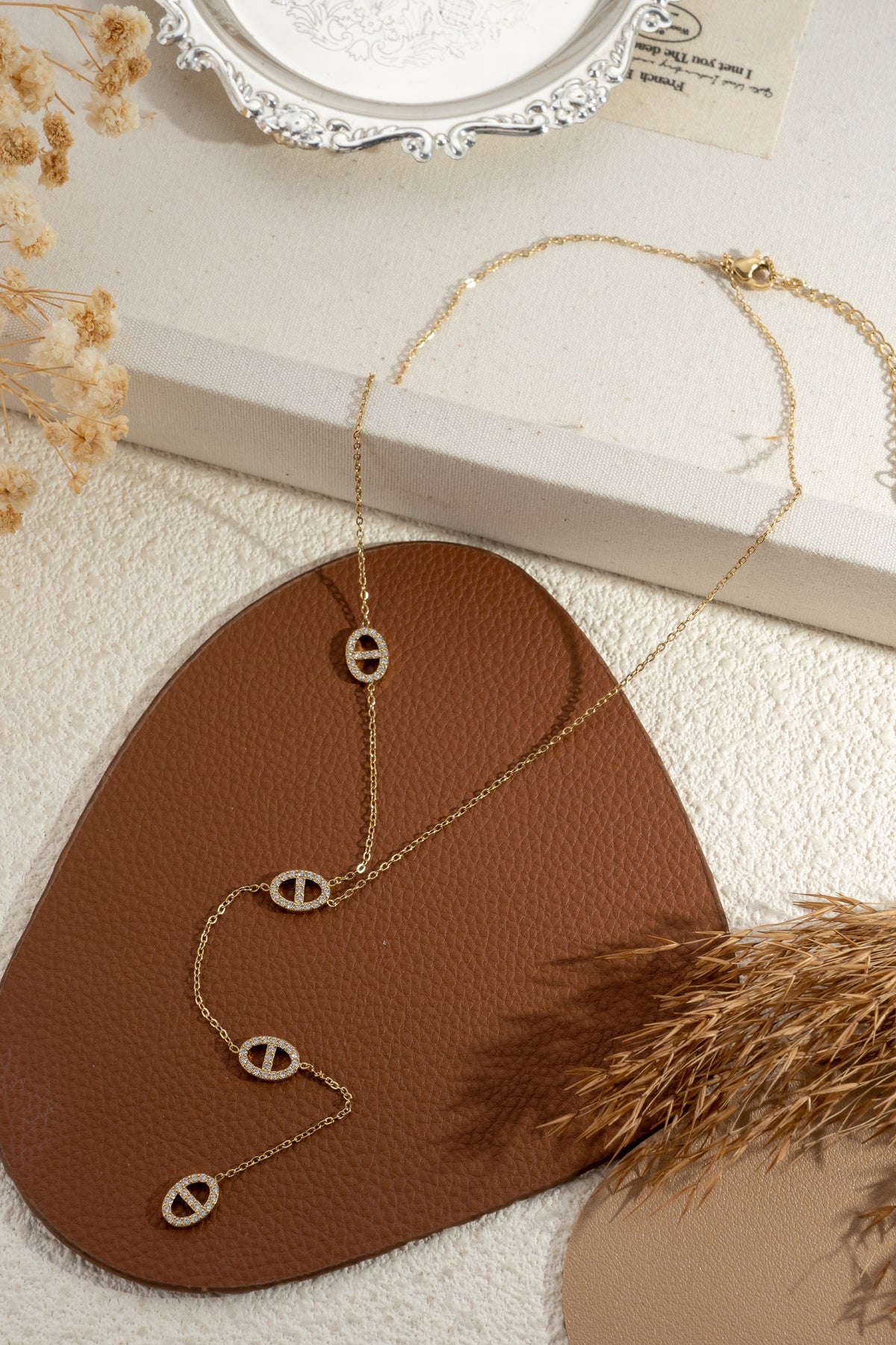 Collier doré mailles marine