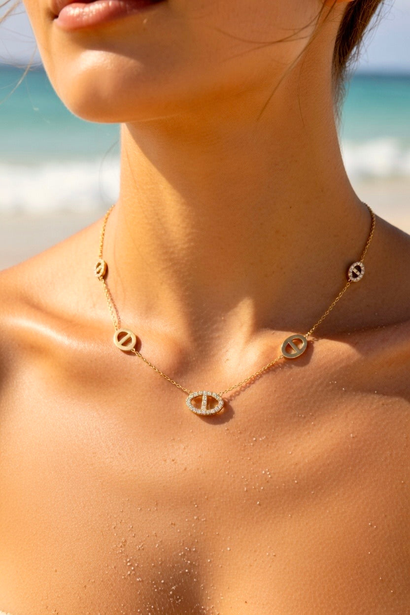 Collier doré mailles marine