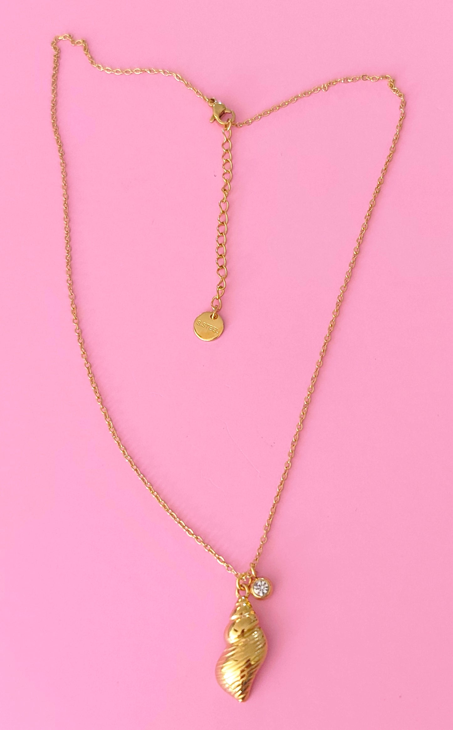 Collier doré escargot de mer🐚✨🌺