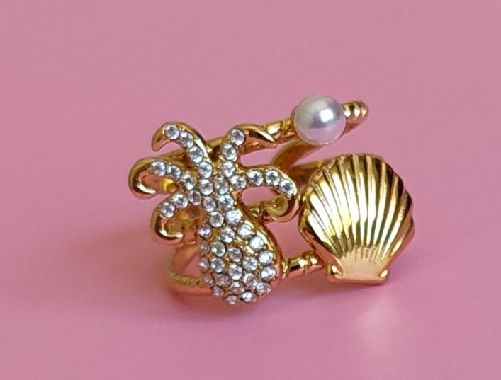 Bague dorée coquillage