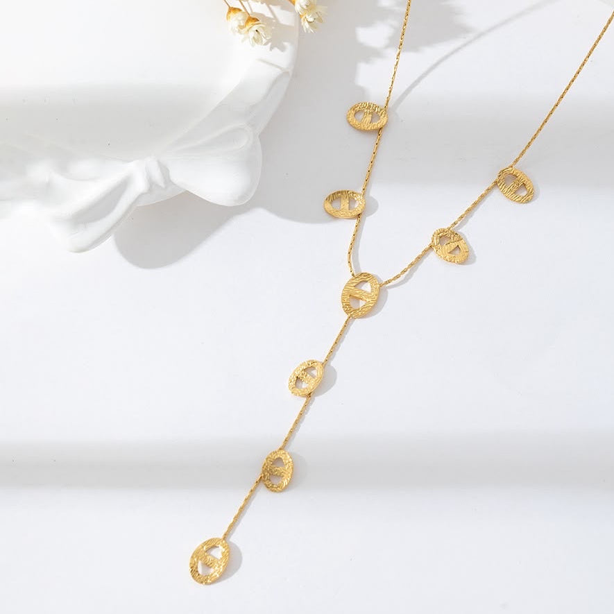 Collier doré mailles marine