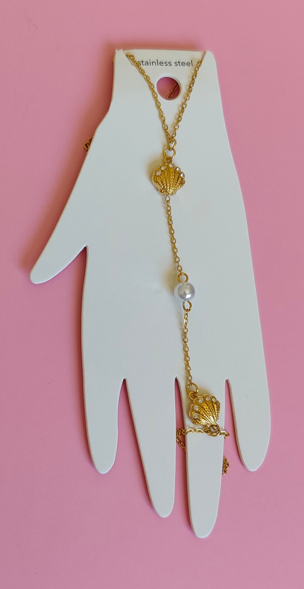 Chaine de main dorée coquillage