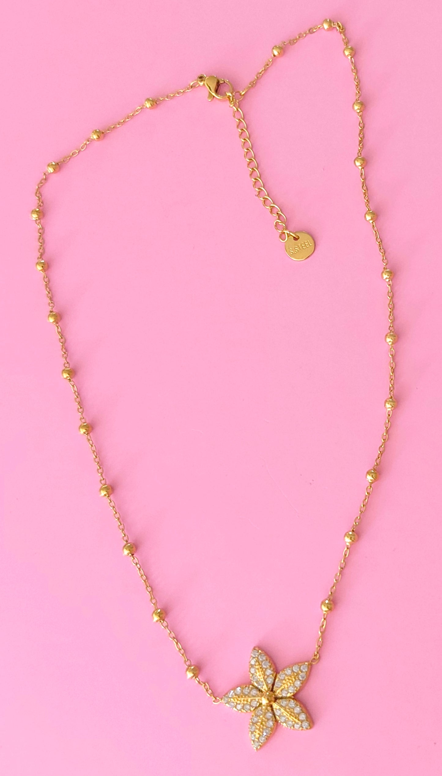 Collier doré fleur