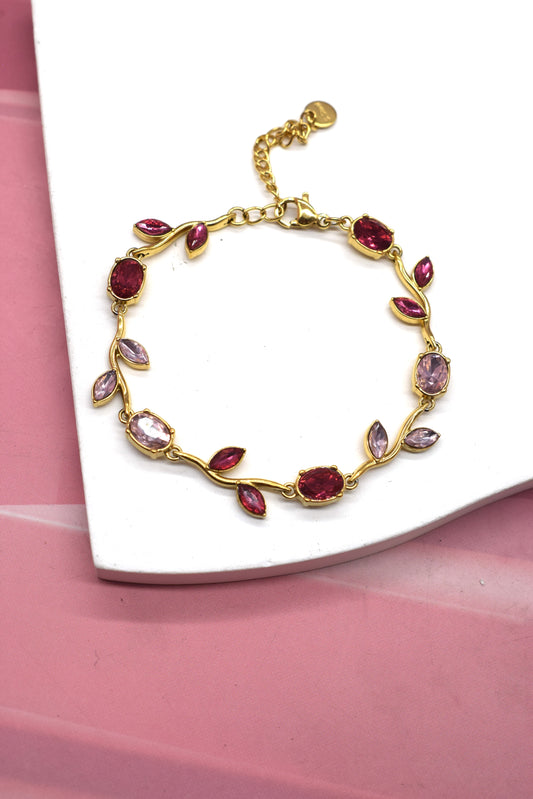 Bracelet doré rose fushia