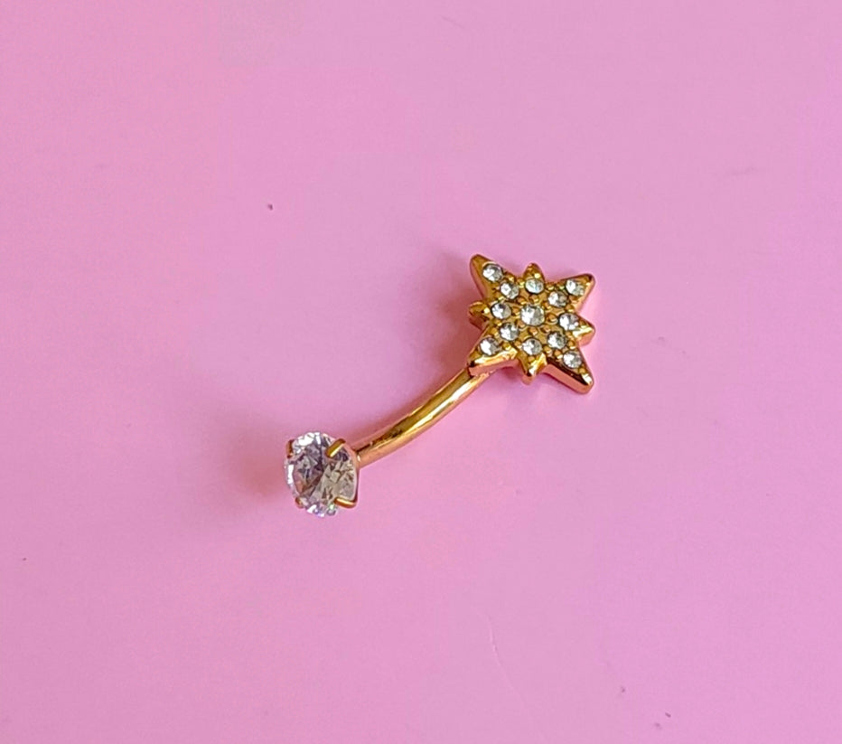 Piercing doré étoile